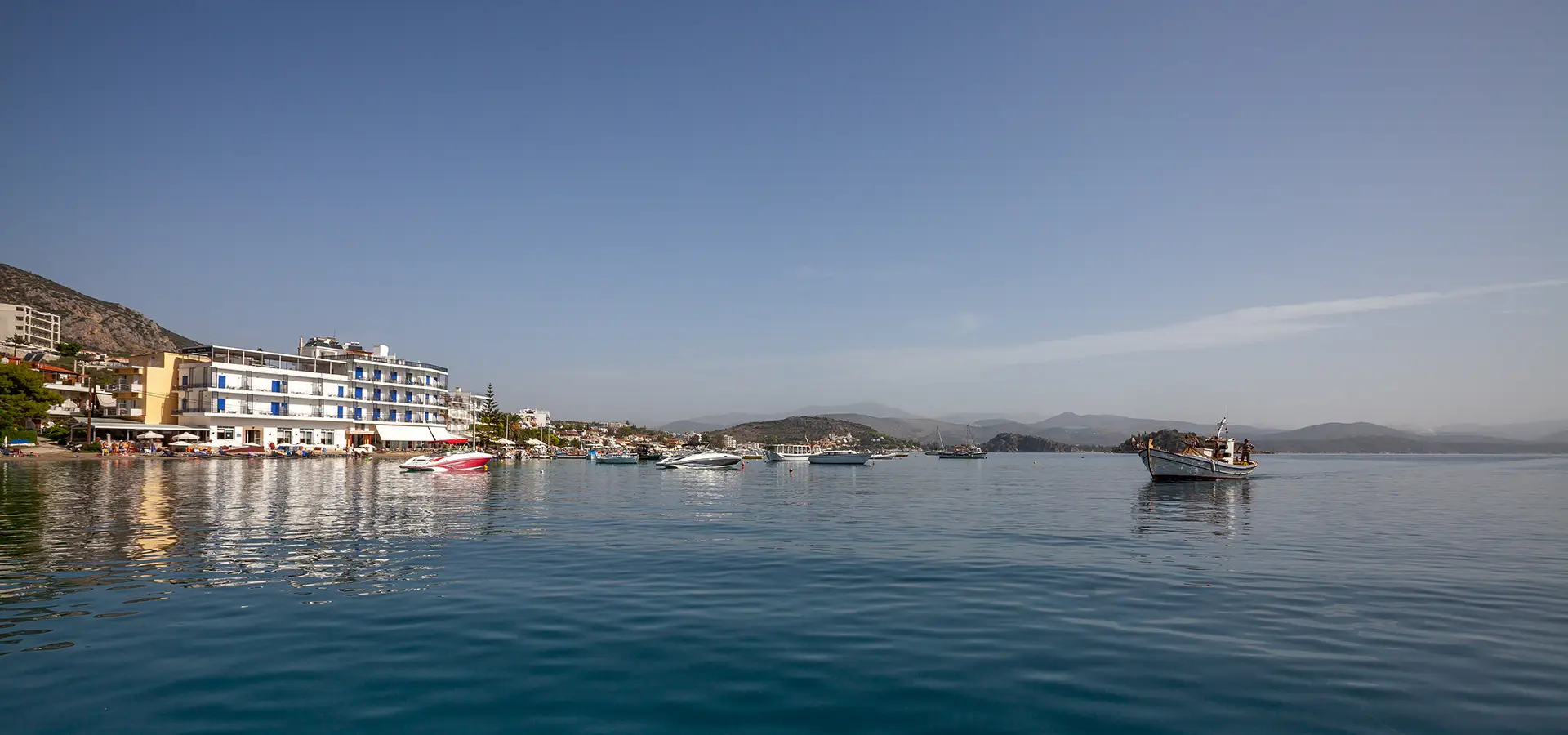 View of Tolo beach from the habrour